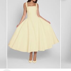 LEAU corset dress. Its beautiful and super flowy. It is size12/14.